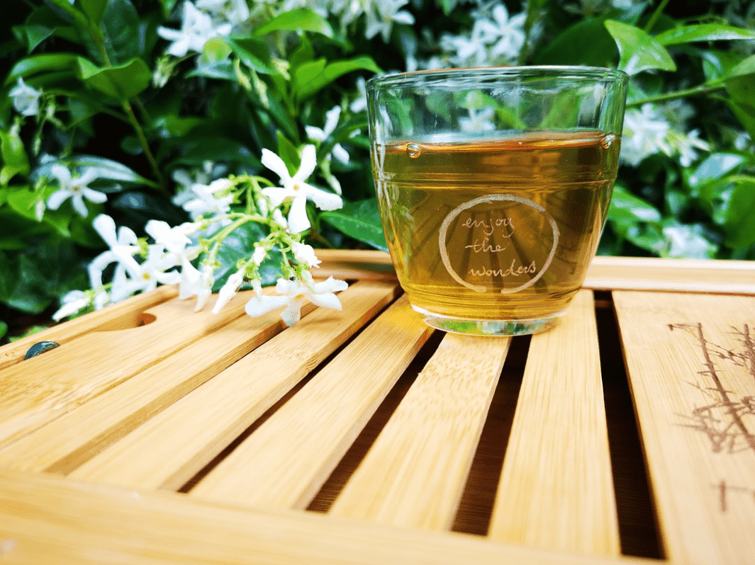 green tea on wooden table